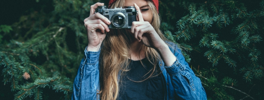 girl taking photo - micro-influencer